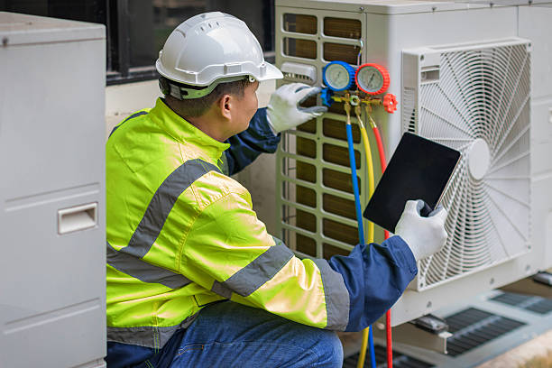 Professional Air Conditioning Repair technician working in Maywood, NJ